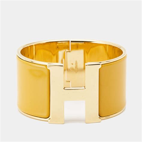 hermes grey pm clic clac yellow gold fashionphile|hermes bracelets for sale.